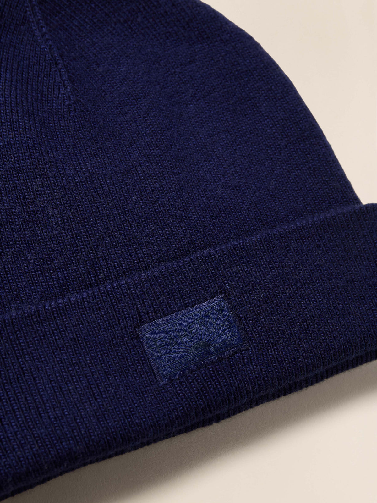 FA25-FAHERTY-NonApparel-YC0161-413-FahertyEssentialBeanie-Navy_DETAIL_1_Web_8003b447-6e25-40a4-a01d-2dbb319d8195.jpg