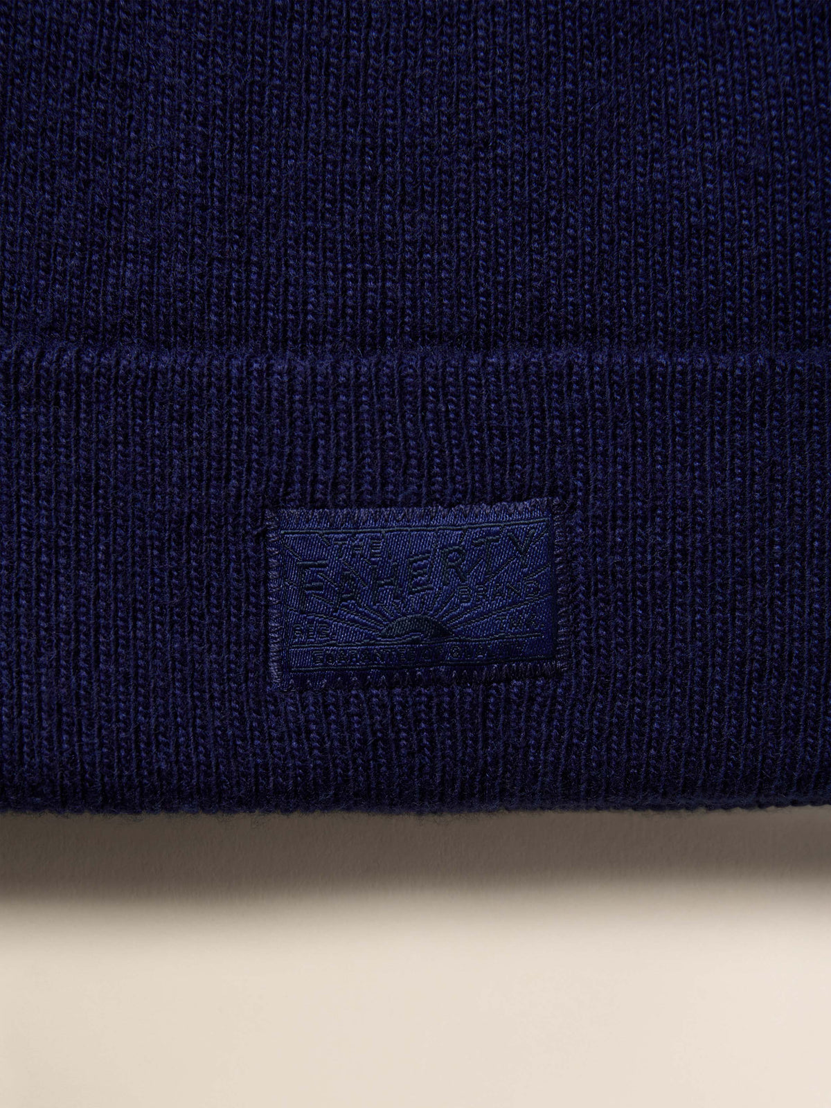 FA25-FAHERTY-NonApparel-YC0161-413-FahertyEssentialBeanie-Navy_DETAIL_2_Web_836b0c84-7e01-4814-b5aa-6a175406807b.jpg