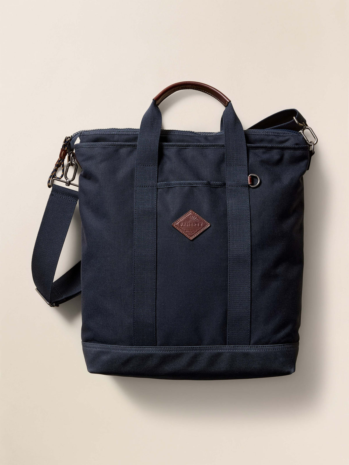 FA25-FAHERTY-UAF2302-NVY-LATITUDETOTEBACKPACK-Navy_FRONT_1_Web.jpg