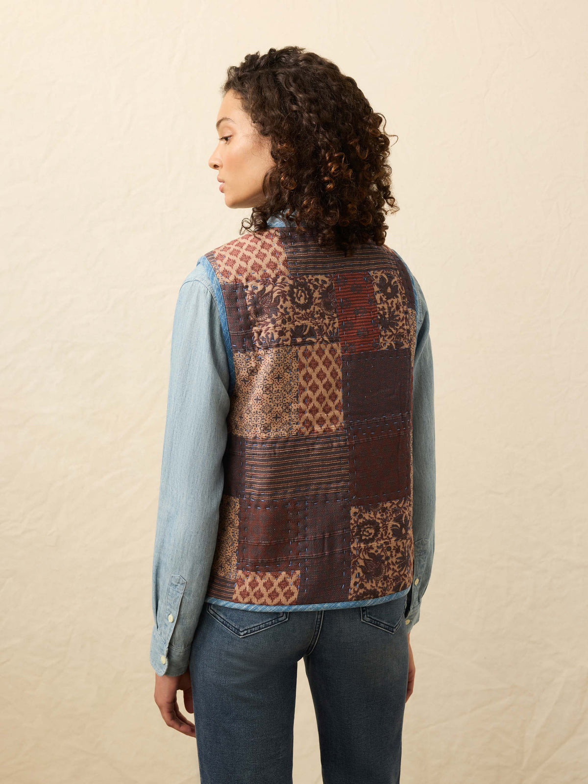 FA25-FAHERTY-Womens-WOF2506-ATW-IndigoQuiltedPatchworkVest-IndraPatchwork_OM_BACK_CROP_1_Web.jpg