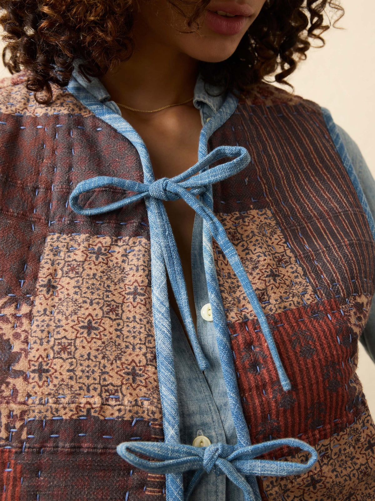 FA25-FAHERTY-Womens-WOF2506-ATW-IndigoQuiltedPatchworkVest-IndraPatchwork_OM_DETAIL2_1_Web.jpg