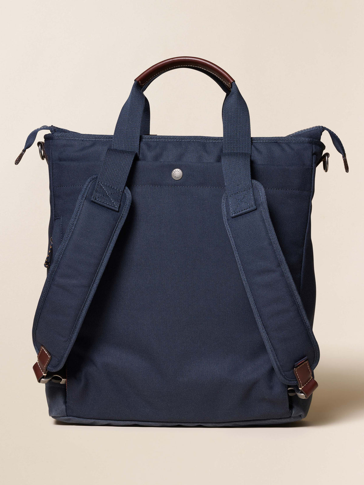 FA25-Faherty-Unisex-UAF2302-NVY-LAYDOWN-LATITUDETOTEBACKPACK-Navy_BACK_1_Web.jpg