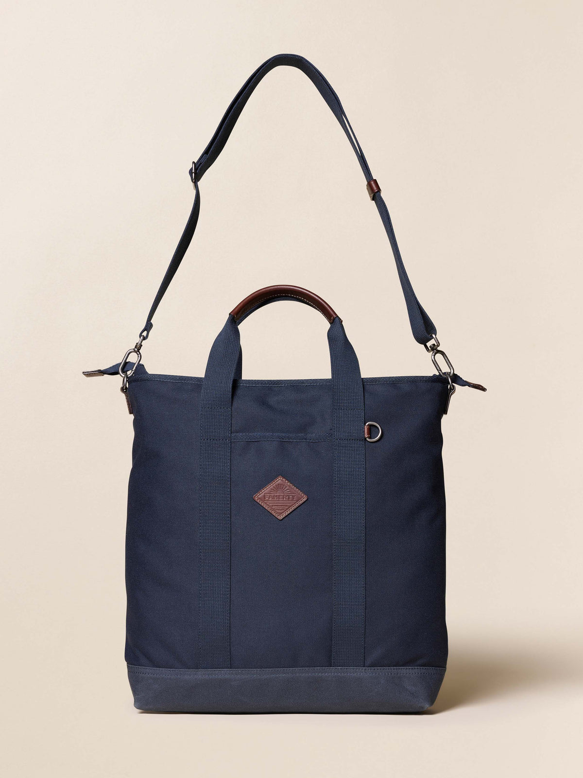FA25-Faherty-Unisex-UAF2302-NVY-LAYDOWN-LATITUDETOTEBACKPACK-Navy_FRONT_2_Web.jpg