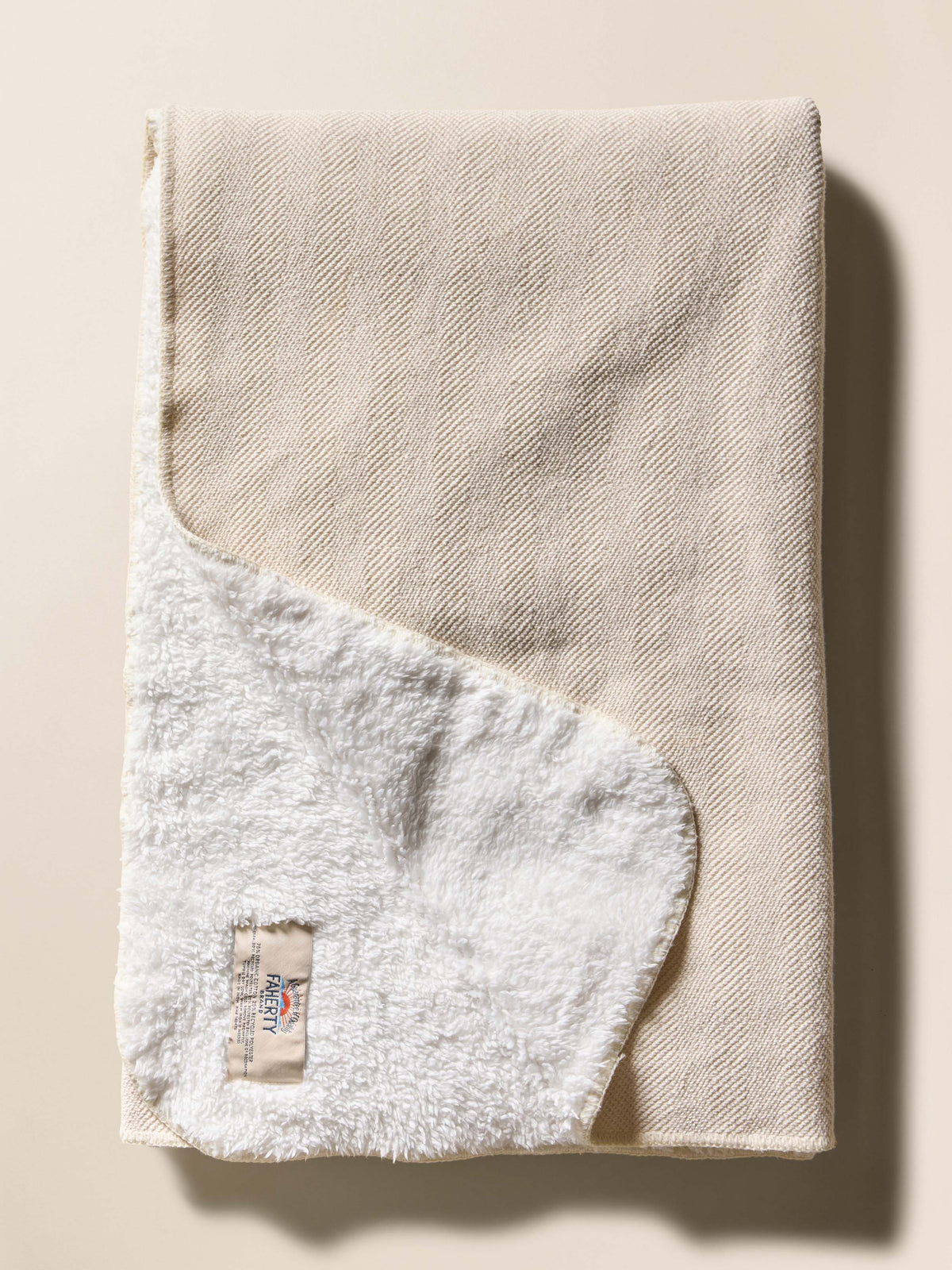 HO25-FAHERTY-Accessories-HAC0112-SMD-WhitewaterHpFlcBlanket-SummerSands_FRONT_2_Web.jpg