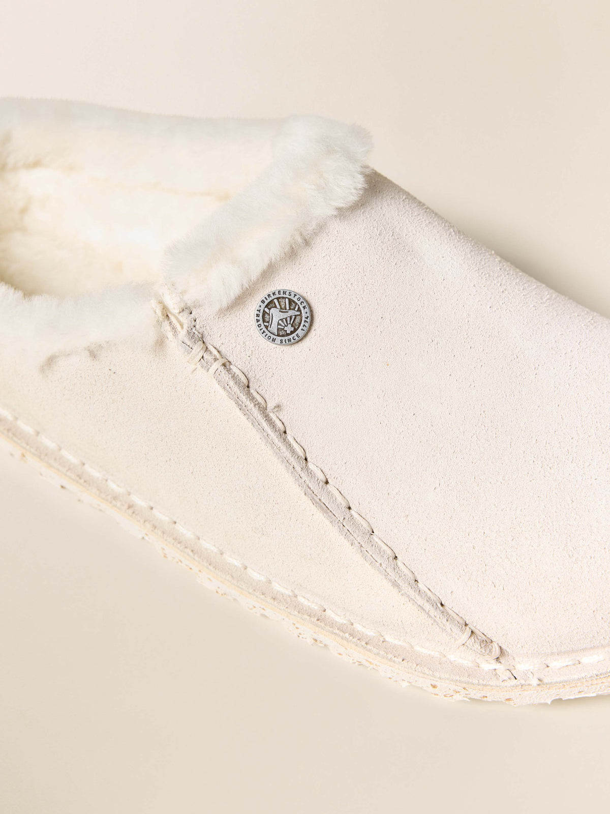 HO25-FAHERTY-NA-WFC0053-AQW-LAYDOWN-BirkenstockZermattPremiumSlipper-AntiqueWhite_DETAIL_1_Web.jpg