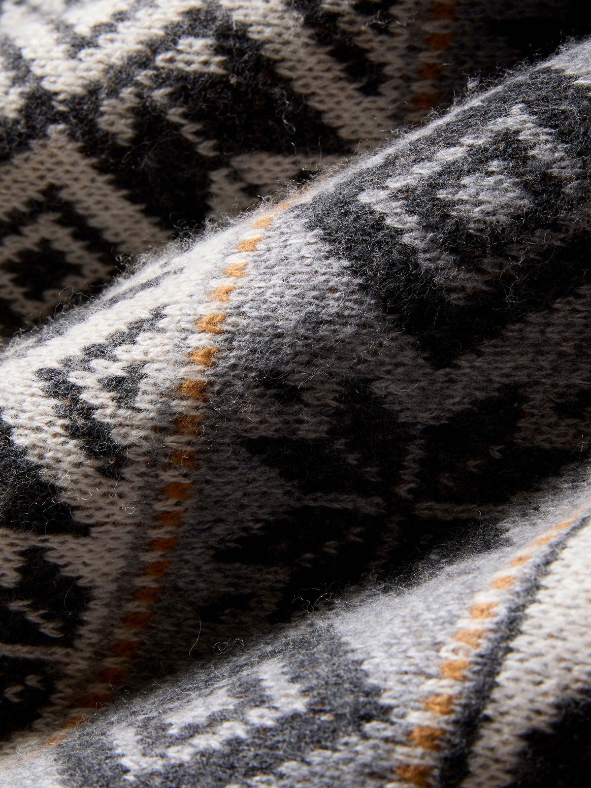 HO25-Faherty-Nonapparel-HAH2504-CCT-NordicFairisleBlanket-CharcoalWinterBeach_DETAIL_1_Web.jpg