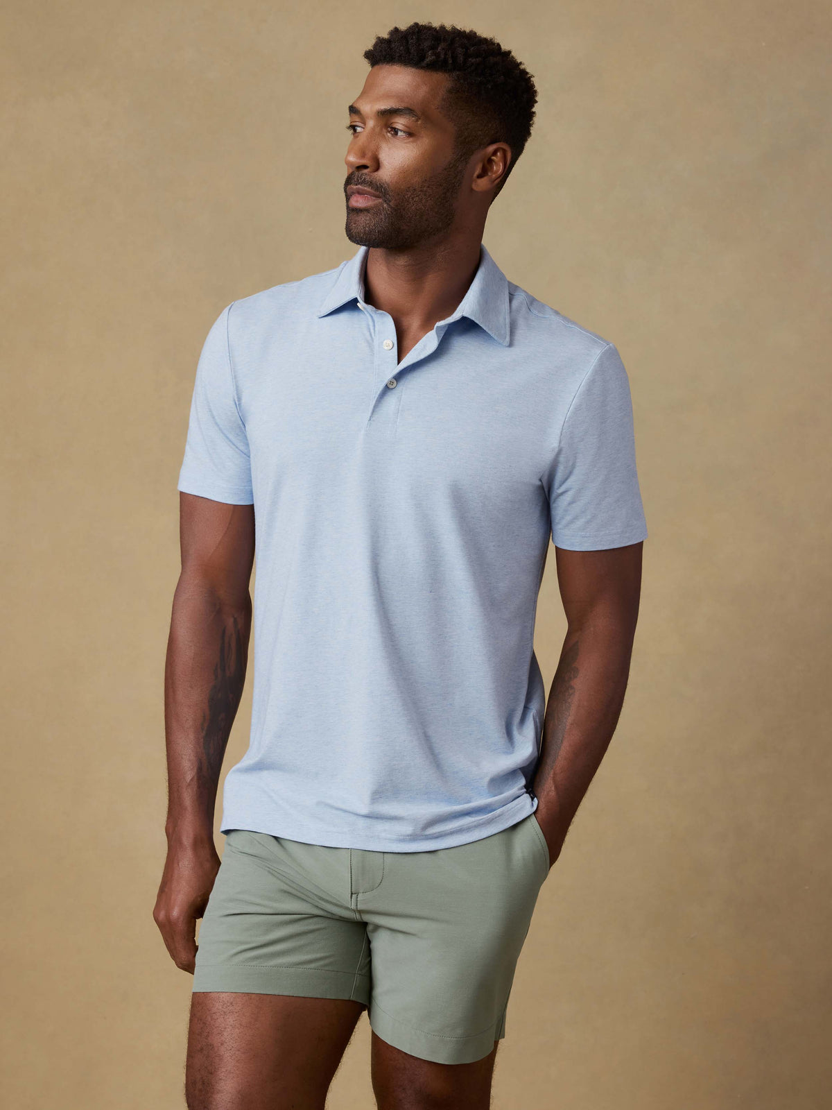 SP26-Faherty-Mens-MKS2425-CDB-Ss_Movement_Polo-Cardiff_Blue_Heather_OM_FULL_BODY_1_Web.jpg
