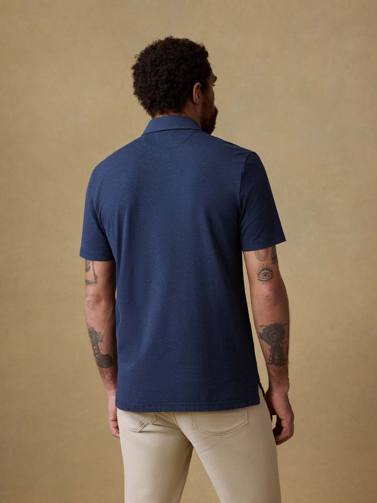 SP26-Faherty-Mens-MKS2425-GFH-Ss_Movement_Polo-Great_Falls_Heather_OM_BACK_CROP_1_Web.jpg