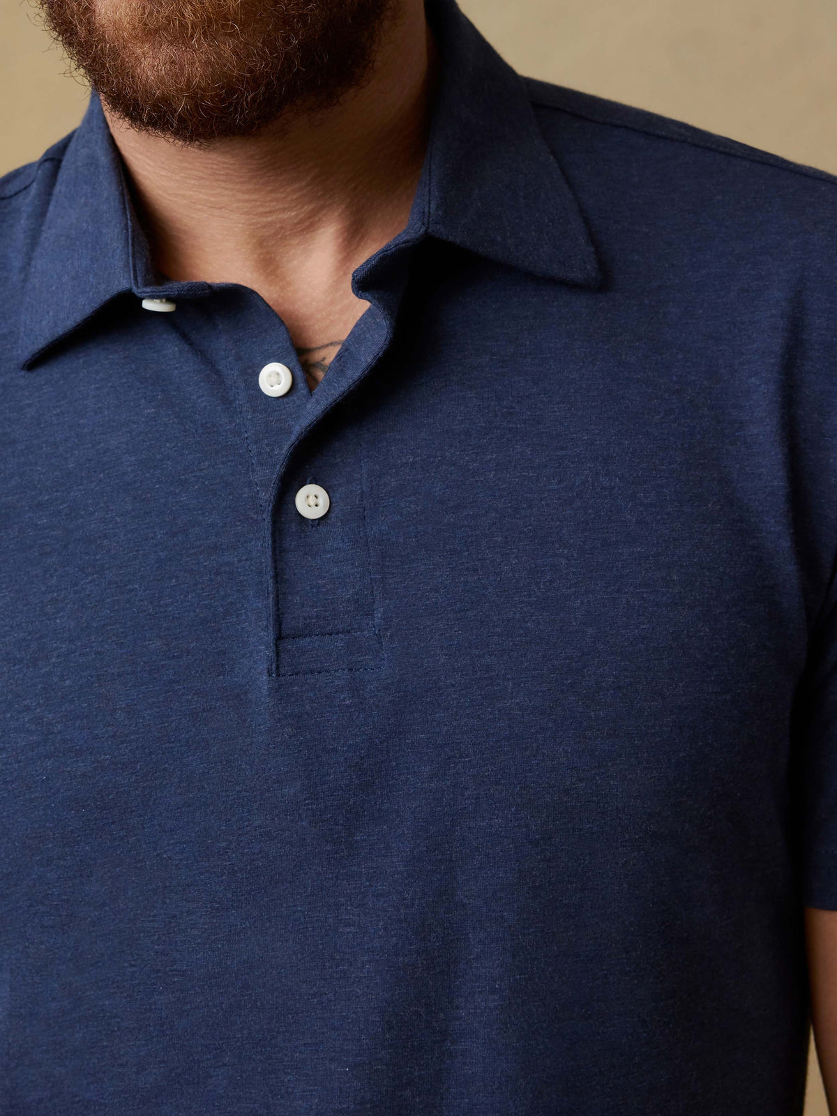 SP26-Faherty-Mens-MKS2425-GFH-Ss_Movement_Polo-Great_Falls_Heather_OM_DETAIL2_1_Web.jpg