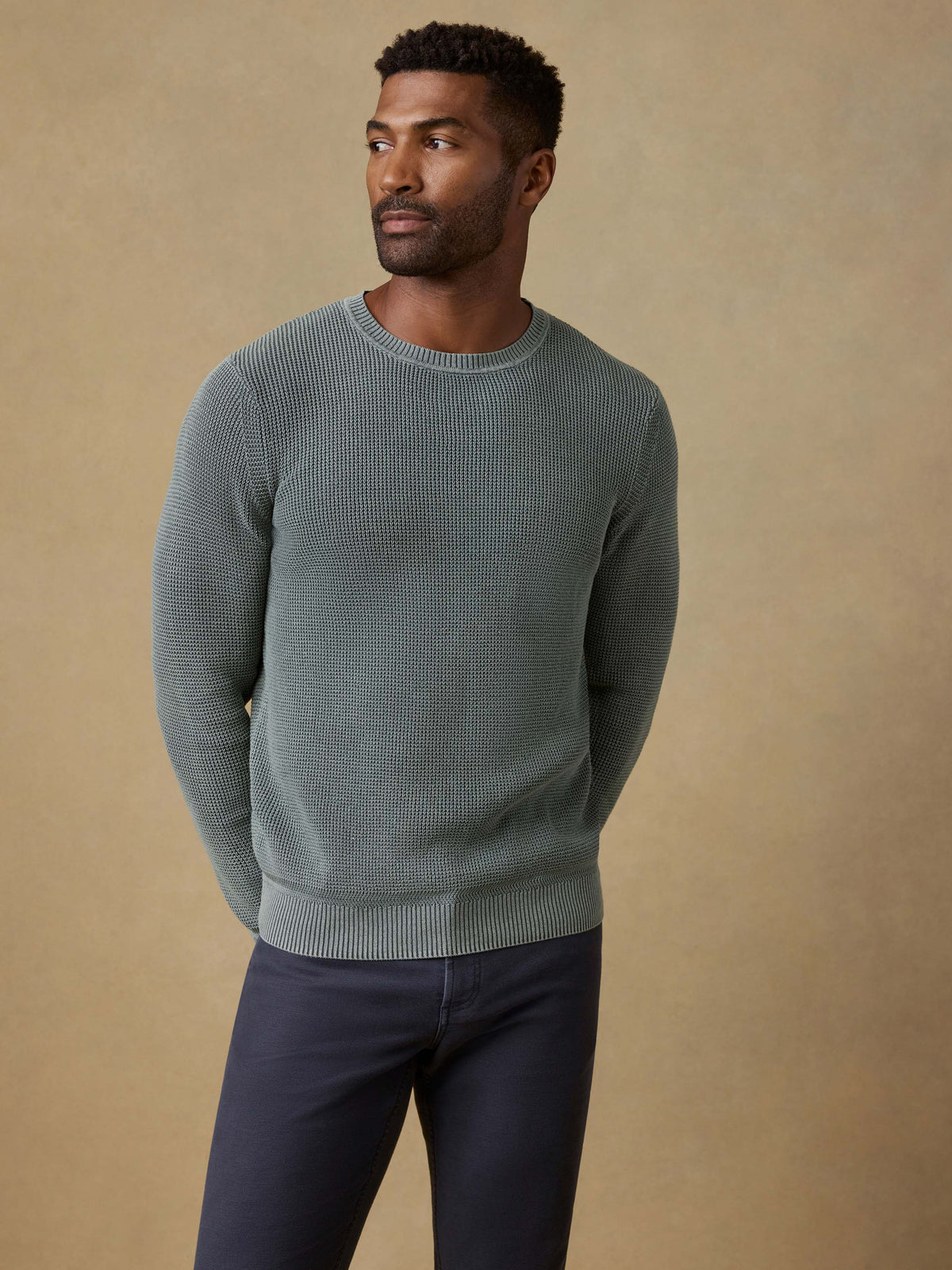 SP26-Faherty-Mens-MYF2313-MOV-SunwashedCrewneckSweater-MountainOlive_OM_FULL_BODY_1_Web.jpg