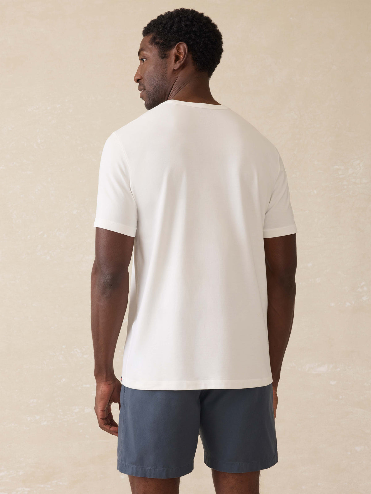 SU25-FAHERTY-MENS-MKS2528-WSS-SsShoreliteUpfTee-WhiteSurfStripe_OM_BACK_CROP_1.jpg